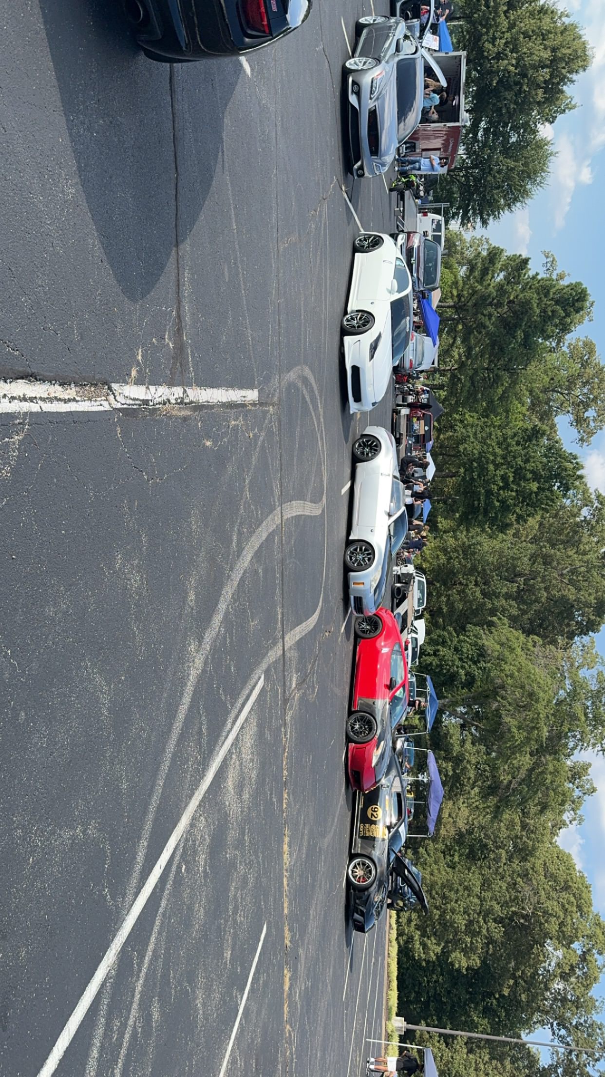 Lineup of Nissan Z cars at a Slammedenuff event